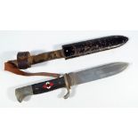 A WWII period German 'Hitler Youth' dagger, with enamelled insignia to the checkered grip,
