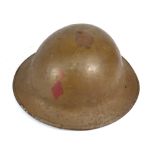 A British WWI period Brodie type helmet with textured finish,