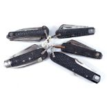 Five army issue clasp knives with checkered faces and ring loop attachments, one by William Rodgers.