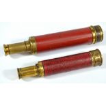 DOLLAND OF LONDON; two small brass three-draw telescopes with stained wooden barrels.