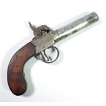 A small percussion cap pocket pistol with screw-off barrel, engraved steel lock and walnut stock,