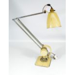 An original 1930s/1940s adjustable counter balanced table lamp with cream painted shade and base