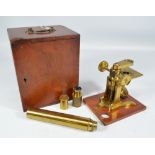 F COX OF LONDON; a cased unnamed brass travelling microscope.