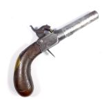 A small percussion cap pistol with screw-off barrel, engraved lock and checkered walnut stock,