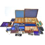 A collection of ophthalmic instruments including ophthalmoscope,