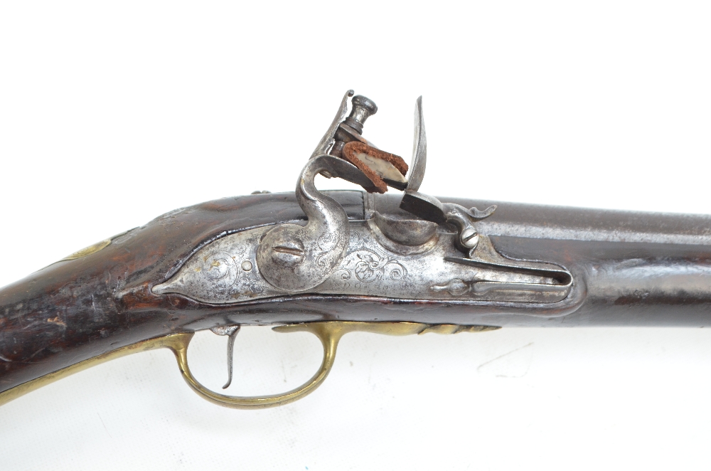 An early Brown Bess style small bore flintlock musket, length 140cm. - Image 2 of 5