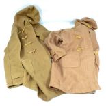 Two British WWII period beige duffle coats,