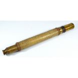 BASSNETT OF LIVERPOOL; a brass single-draw telescope, with rope twist design barrel, length 58.