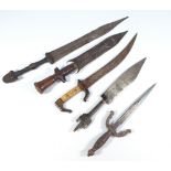 Five unusual 19th/20th century daggers, one with metal rope effect bound grip,