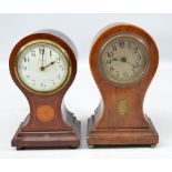 An Edwardian mahogany and satinwood inlaid balloon shaped mantel time piece with circular dial set