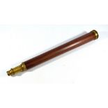 An unnamed 1.25" single-draw brass telescope with wooden barrel, length 51cm.