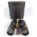 A pair of military issue binoculars inscribed 'C.G.B. 40MA 7x50, 25577-C, Patt.