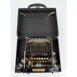 A cased L.C. Smith & Corona typewriter (case af).