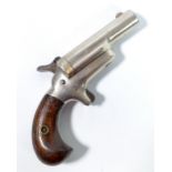 COLT; a muff pistol, the barrel inscribed 'Colt', and with frame stamped '41 Cal',