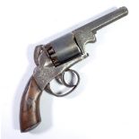 An unusual percussion cap five shot revolver with octagonal barrel, clip,