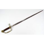 A late 18th century spadroon, with rounded rectangular pommel, fluted walnut grip,