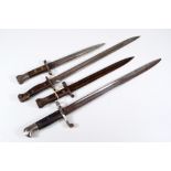 Four military issued bayonets, all with broad arrows and War Department stamps,