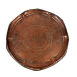 An early 20th century shaped circular copper tray commemorating the centenary of Nelson's victory
