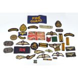 A small collection of military and public service cloth badges to include Royal Navy, Fire Guard,