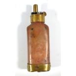 A copper and brass mounted powder flask with two hinged covers to the base, unnamed, length 12.5cm.