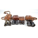 Four cased pairs of French binoculars including a pair inscribed to the lid 'Huet & Cie of Paris'
