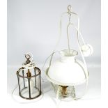 An Art Nouveau silver plated hall lantern with cylindrical glass inner section and openwork frame,