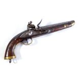 A flintlock pistol, with steel barrel, brass furniture, walnut stock and ring loop attachment,