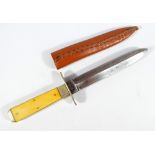 An IXL knife with ivory faced grip and shaped blade, inscribed 'C Wostenholm & Son, Ashington Works,