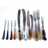Two agate handled three tine forks, two similar knives,