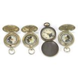 Three WWI period military issue pocket compasses, all with identical dials and broad arrow marks,