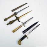 A small knife with lion head pommel, checkered grip,