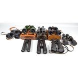 Eight pairs of various military binoculars including Bino Prism no.5 Mk.