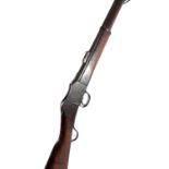 An 1877 Enfield Martini action 2-band carbine rifle, the lock plate inscribed 'V.R.