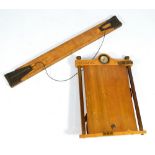 A military issue boxwood and beech Major Verner's patent arm mounted map roll with compass and