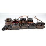 Eight pairs of cased unnamed binoculars (8).