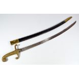 A WWI period sabre, with foliate embossed brass handle, curved blade and leather and brass scabbard,