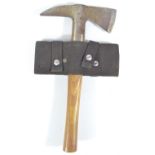 A mid-20th century British military issue wooden handled hatchet,