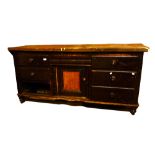 A Victorian pine dresser base with rounded rectangular top (af).