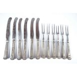 A set of six silver sheath handled Georgian knives and forks with steel blades and two tine forks,