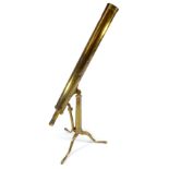 An unnamed 2.25" brass telescope, with brass tripod and sliding side bracket, length 77.5cm.