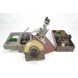 A small group of 20th century scientific instruments comprising a cased astro-compass MK.
