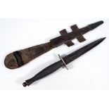 A Sykes Fairbairn type commando knife, with horizontal ring grip and shaped blade,