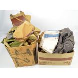 A quantity of WWII and later military canvas bags of varied shapes and sizes,