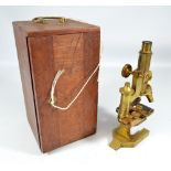 BECK LTD OF LONDON; a cased brass monocular microscope, no.