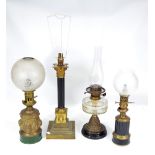 A brass moulded Gothic oil lamp with etched globular shade, a Corinthian column oil lamp,