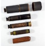 Four unnamed three-draw black lacquered brass telescopes (4).