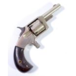 A small five shot rimfire revolver, the barrel stamped 'Volunteer', and with rosewood stock,