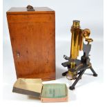 WATSON & SONS OF LONDON; a brass and lacquered cased microscope, stamped 'Agent Kemp & Co Ltd,