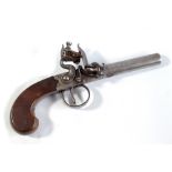 A small flintlock pocket pistol with screw-off barrel and walnut stock, length 23cm.