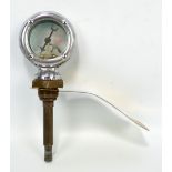 A calormeter by Wilmot-Breeden Ltd, in chromed case, total length 19cm.